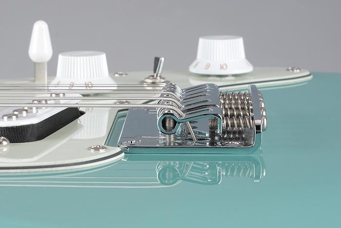 F106 bridge with comfort round steel saddles