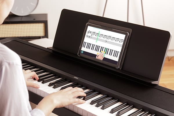 Included music rest for sheet music and mobile devices