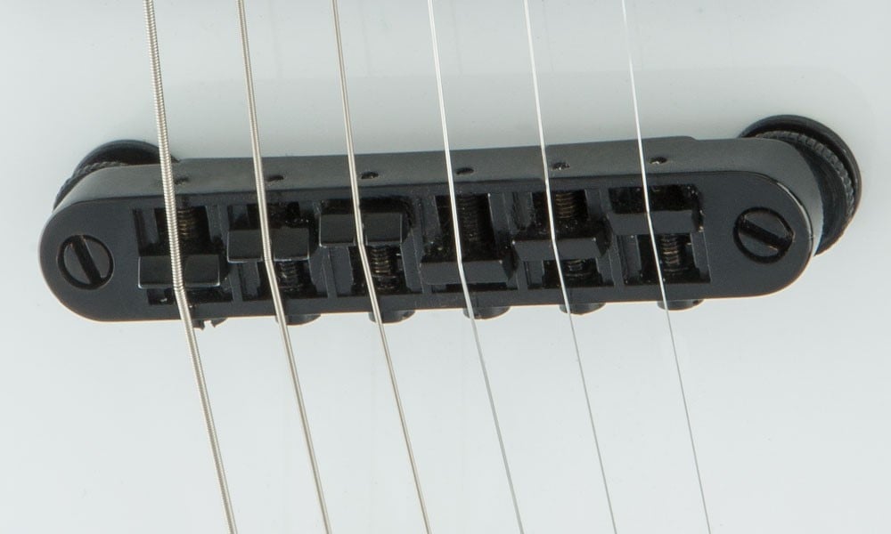 JACKSON COMPENSATED AND ADJUSTABLE STRING-THROUGH-BODY BRIDGE
