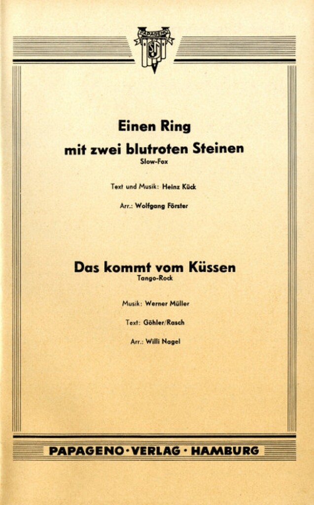 Einen Ring mit zwei blutroten Steinen